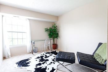 Relaxing Chair at Fairfax Apartments - Lansing, MI, Lansing